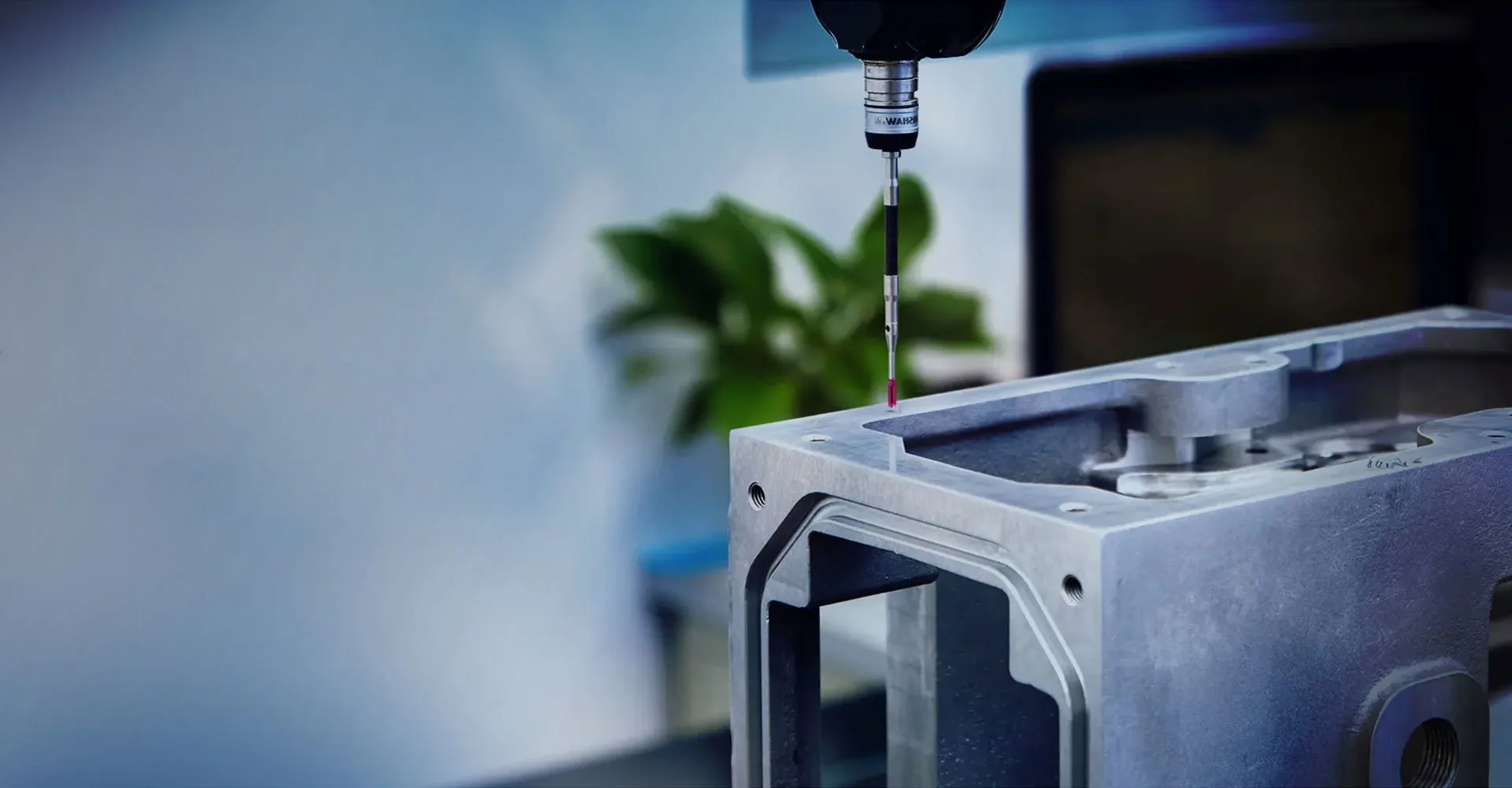 CMM probe inspecting a precision die-cast part